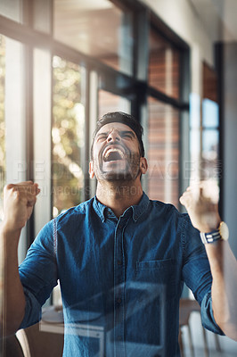 Buy stock photo Celebrating, winning and excited businessman with fist pump gesture and yes expression feeling excited. Young, happy male entrepreneur with cheering emotion to celebrate win or great business success