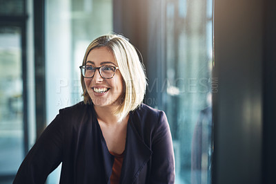 Buy stock photo Shot of a happy businesswoman in a modern office