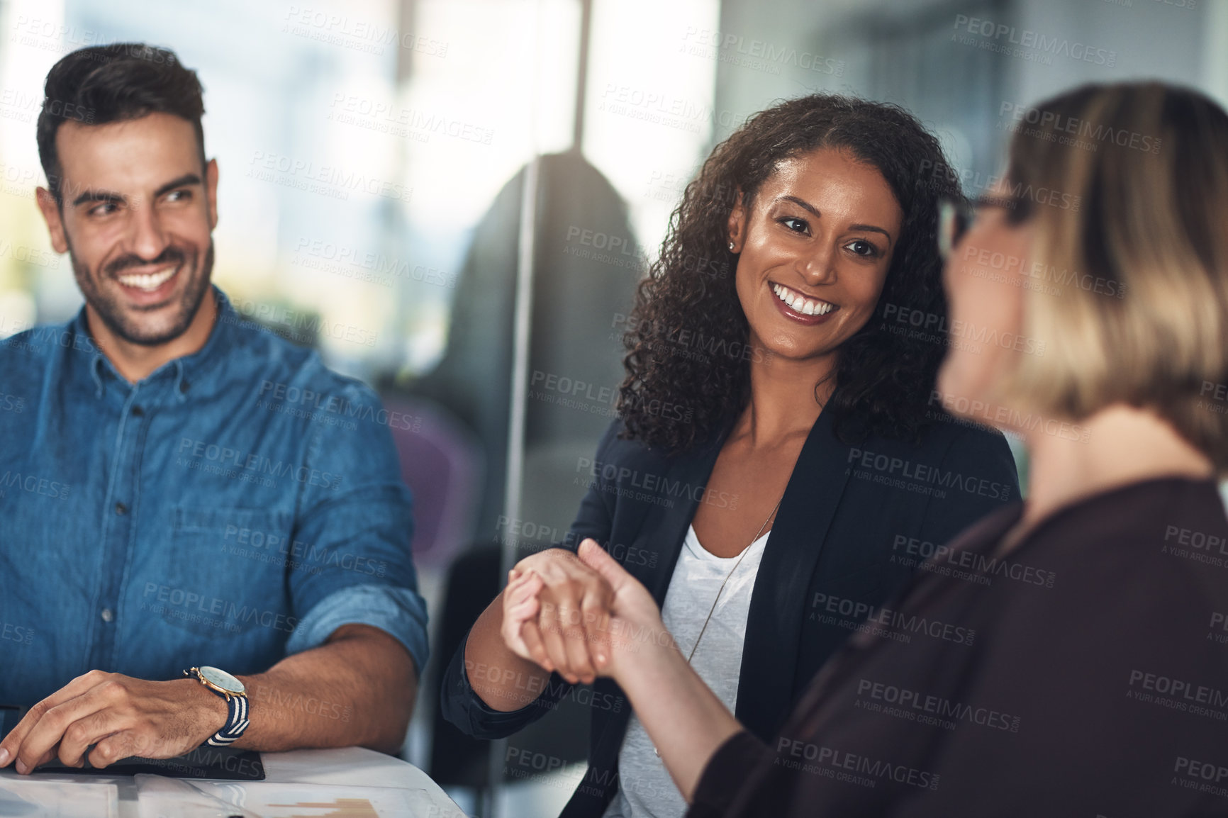 Buy stock photo Handshake, collaboration and business deal while introducing, congratulating and wishing a colleague good luck for leadership promotion. Diverse businesspeople celebrating growth and team contract