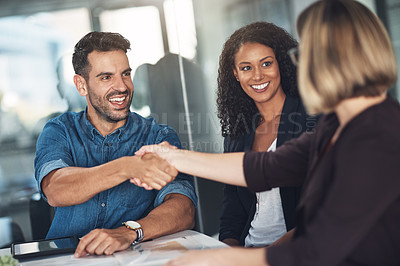 Buy stock photo Handshake and teamwork by business people, colleagues and coworkers in a meeting, discussion or negotiating at work. Corporate professionals greet, make a deal and collaborate in an office boardroom