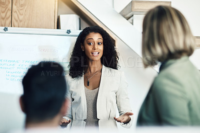 Buy stock photo Presentation meeting, speaker and business woman talking, planning and giving proposal, report or strategy plan. Project management, communication and biracial manager with sales pitch ideas