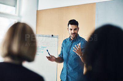 Buy stock photo Presentation board, workshop meeting and man training, coaching or teaching audience, trade show event or seminar. Discussion, info and business leader, speaker or person talking to conference group