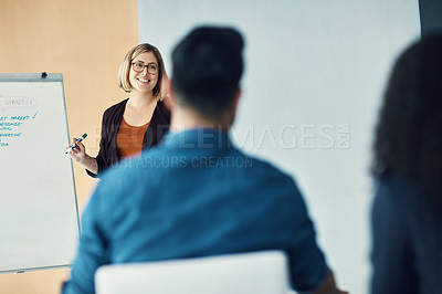 Buy stock photo Presentation meeting, seminar speech and happy woman talking to tradeshow, sales team or investment clients. Event presenter, whiteboard and female business leader chat to listening conference group