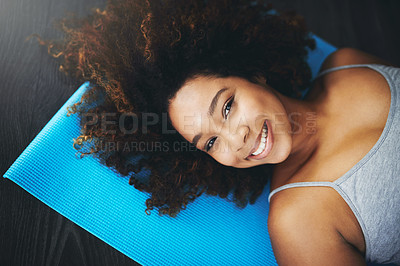 Buy stock photo Portrait, relax and smile with woman on yoga mat for exercise, wellness and pilates studio from top view. Workout, happiness and fitness with above of person at home gym for break, peace and health