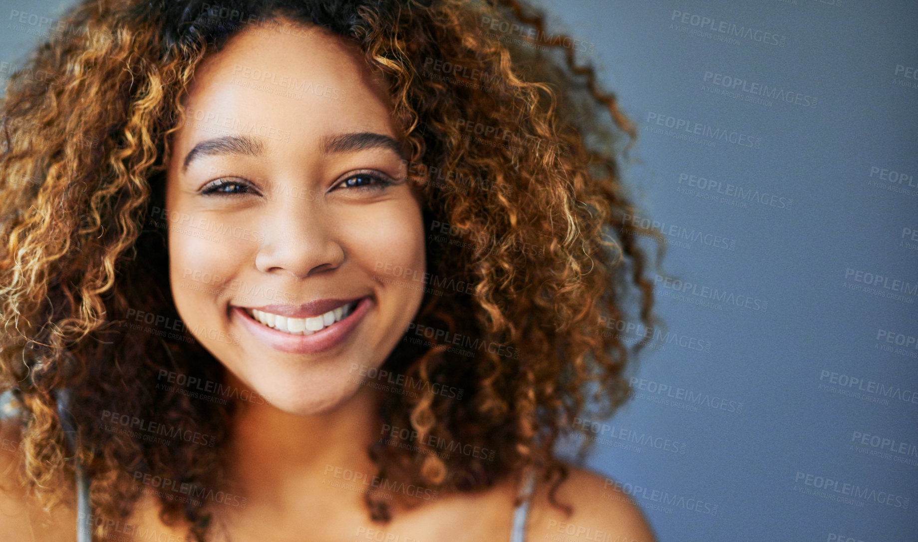 Buy stock photo Happy, African woman or portrait for beauty, hair care or natural space for cosmetology and cosmetics. Gray background, healthy growth texture mockup or studio for smile or curly hairstyle in Somalia