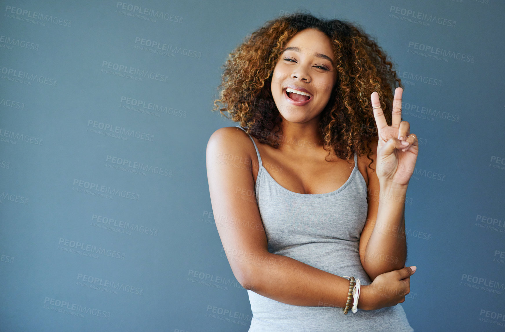 Buy stock photo Girl, smile and peace sign with studio portrait, emoji and mockup space for vote by background. Woman, person and model with pride with v icon, symbol or happy for choice with confidence in Colombia