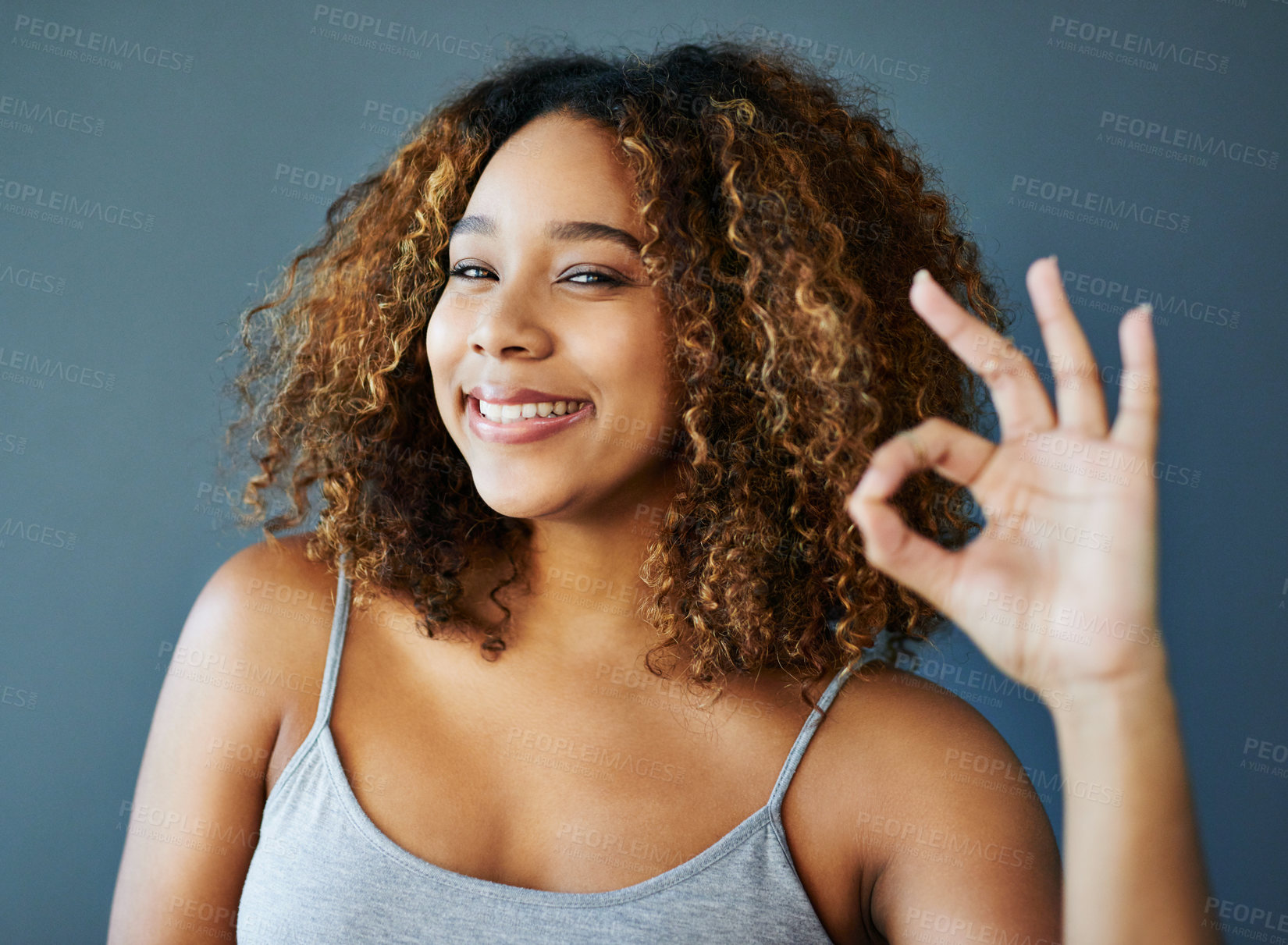 Buy stock photo Woman, smile and ok sign with studio portrait, emoji and decision with agreement by background. Girl, person and model with pride with icon, symbol and happy for choice with confidence in Costa Rica