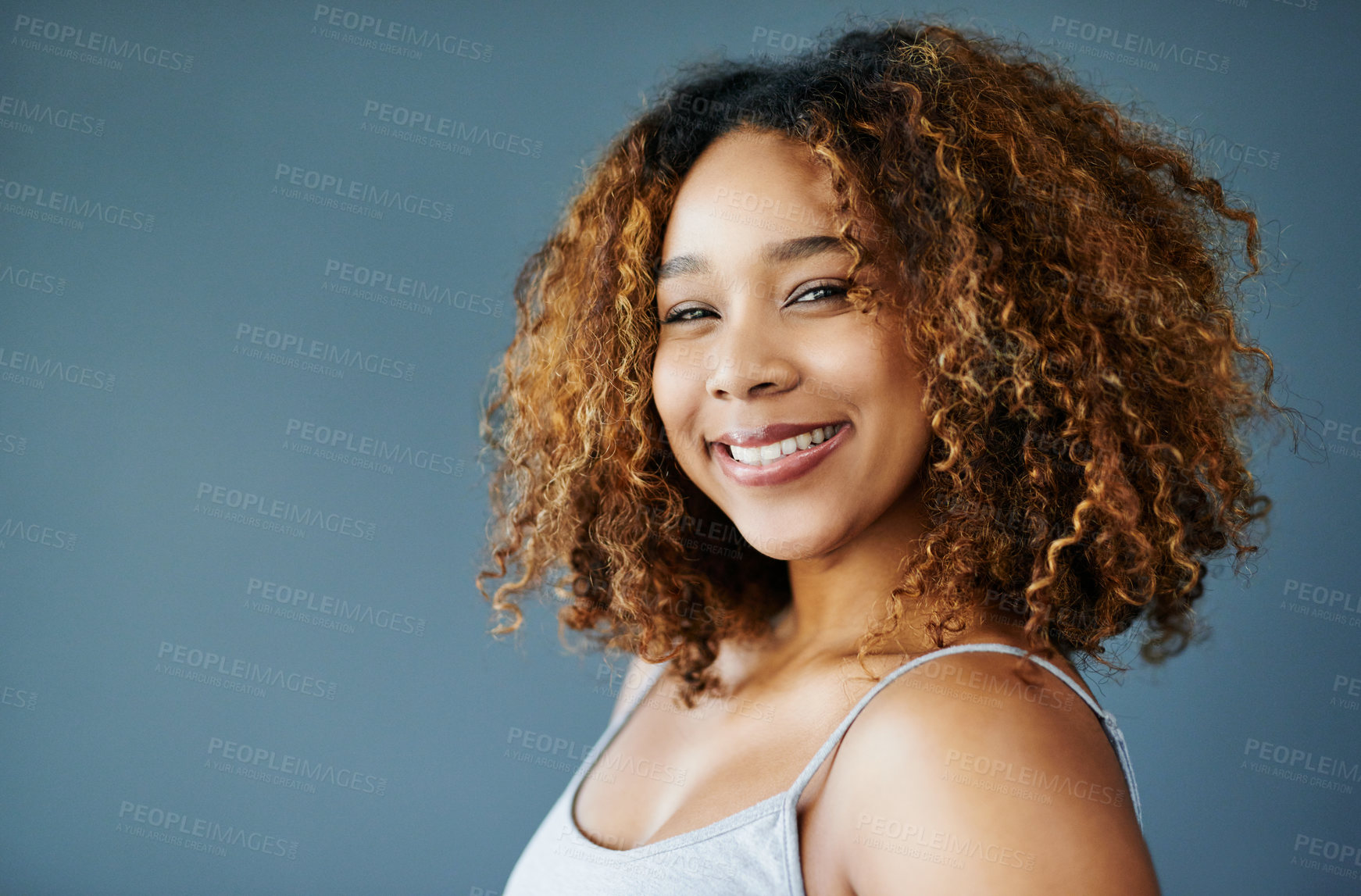 Buy stock photo Happy, African woman or mockup for hair care, portrait or natural afro for skincare beauty or cosmetics. Gray background, healthy glow space or confident model in studio with smile or pride in Brazil