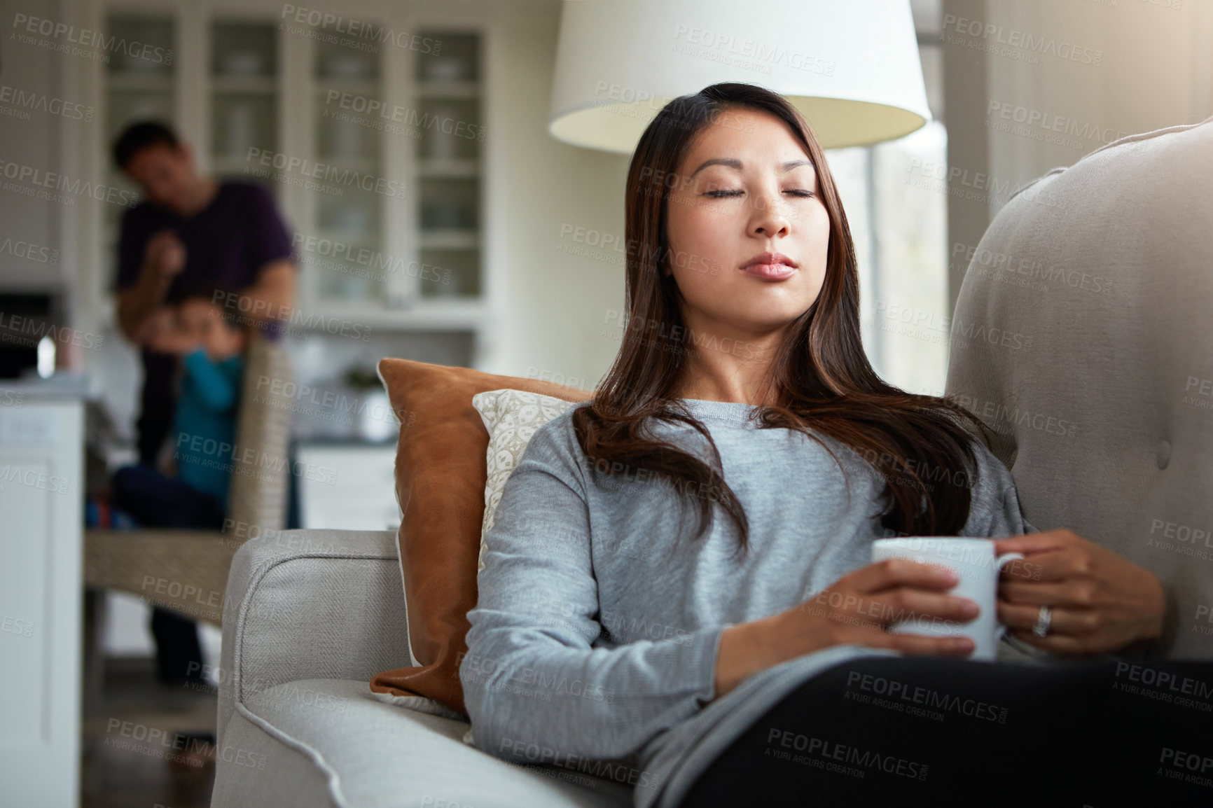 Buy stock photo Relax, coffee and woman with eyes closed on sofa for comfortable, satisfaction or weekend break in living room. Wellness, calm and female person with mug for peace, resting or morning tea in home