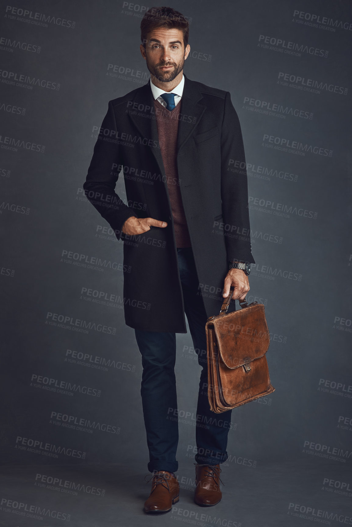 Buy stock photo Studio, serious and portrait of businessman with briefcase for literary career, fashion or confidence. Author, ambition and bag with pride for publishing company, style or elegance by gray background