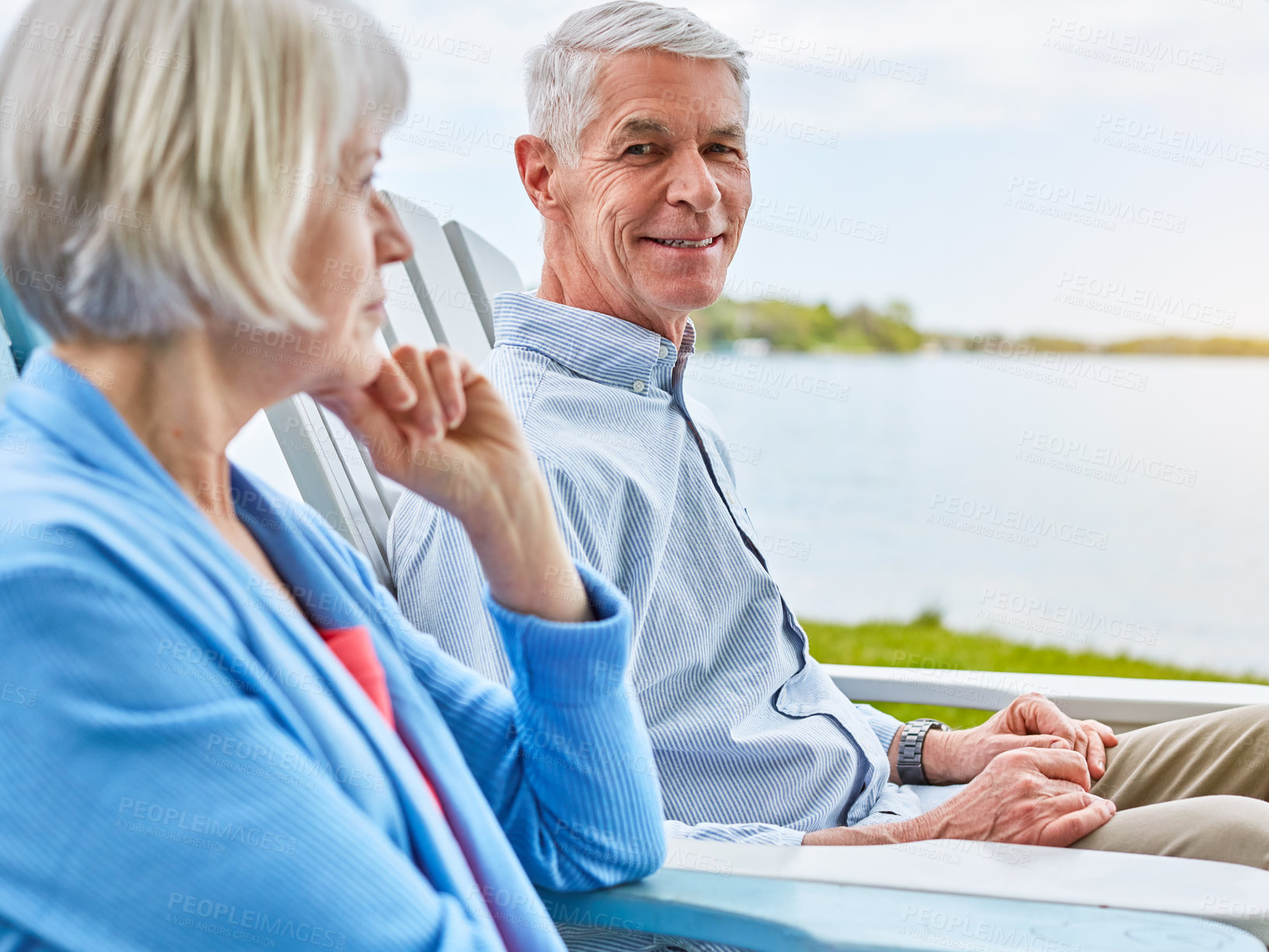 Buy stock photo Portrait of a senior couple relaxing on chairs together outside