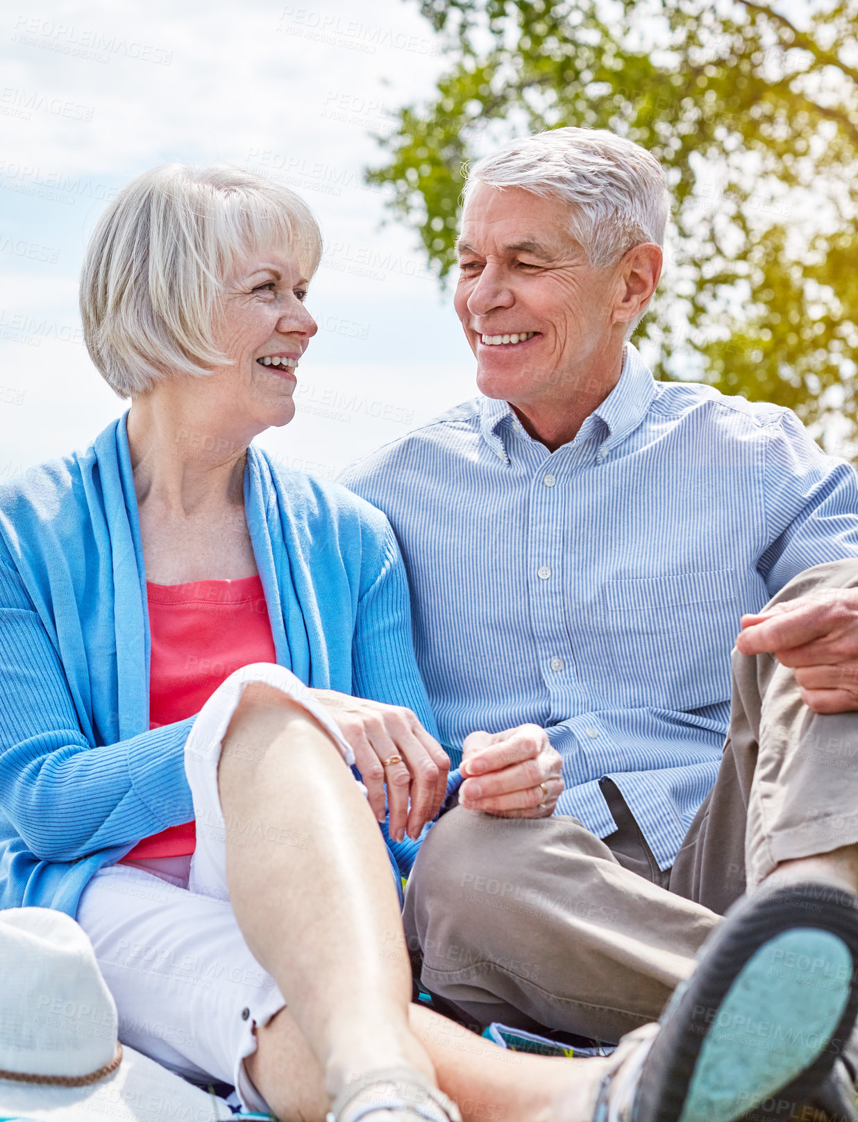Buy stock photo Outdoor, happy and old couple on date, relax and bonding on summer holiday, laughing and retirement. Break, senior woman and smile with elderly man in nature, romance and together on vacation or rest