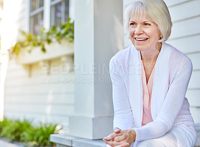 Buy stock photo Cropped shot of a senior woman sitting on her porch during the summer