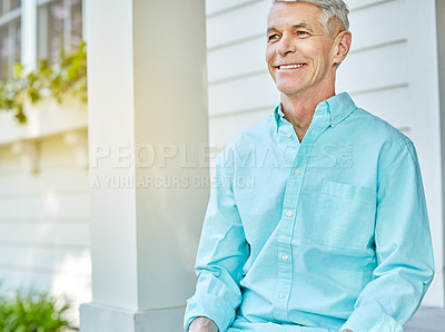 Buy stock photo Cropped shot of a senior man sitting on his porch during the summer