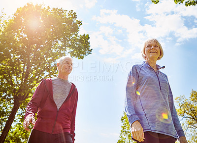 Buy stock photo Life insurance, senior couple and walk in nature for retirement, security and laughing in park. Elderly man, woman and together for support with leisure, happiness or fitness outdoors in Australia