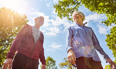 Buy stock photo Senior couple, happiness and retirement in nature for life insurance, security and walk in park. Elderly man, woman and together for support with cover, laughing or fitness outdoors in Australia 