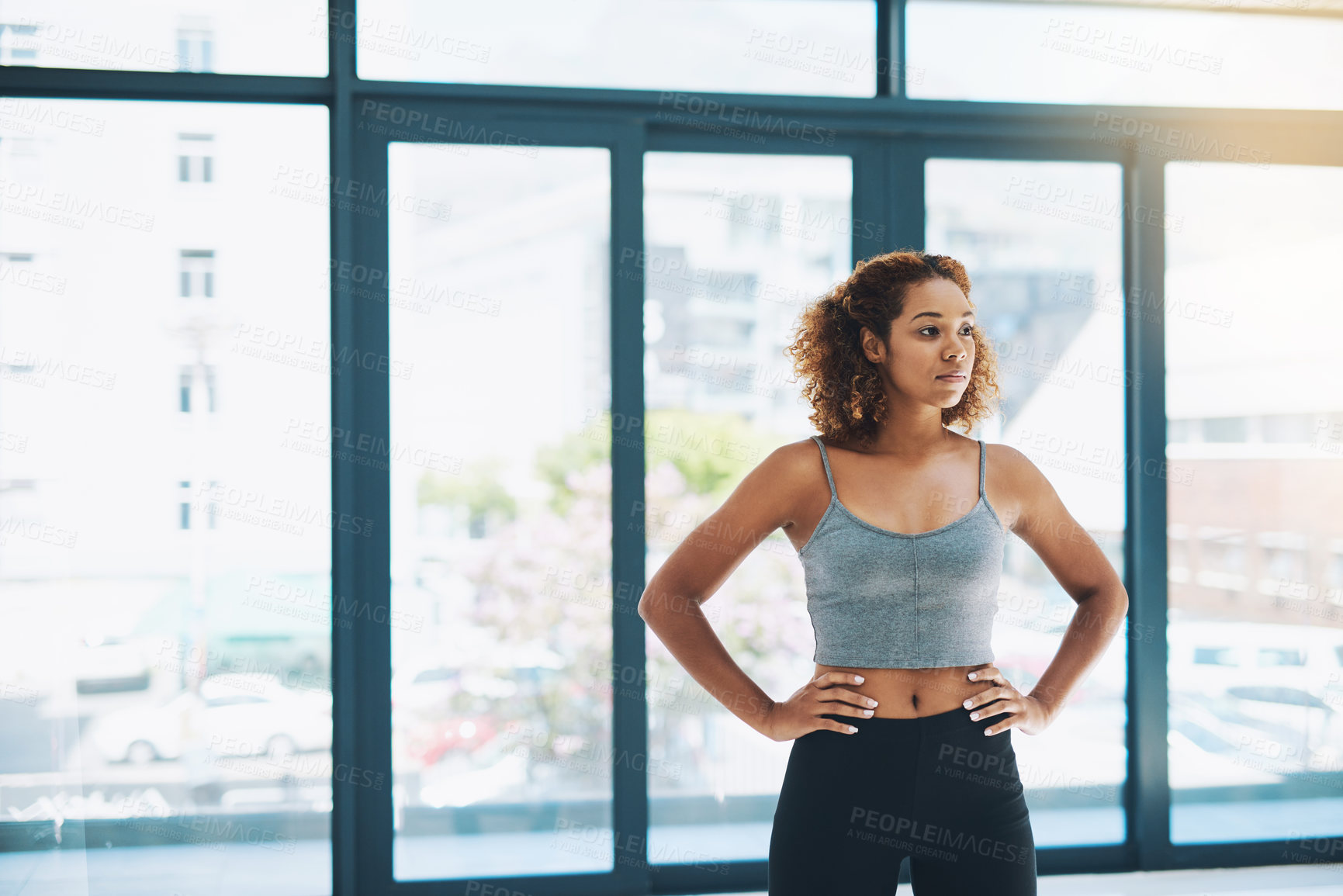 Buy stock photo Gym, woman and serious for exercise as personal trainer in class for cardio with fitness, workout and training. Female person, instructor and confident for wellness, health and wellbeing for care