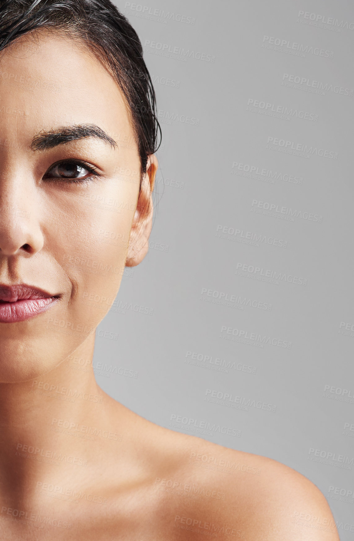 Buy stock photo Woman, portrait and beauty with skincare at salon for haircare, cosmetics or makeup on a gray studio background. Face of young female person or model for hygiene or facial treatment on mockup space