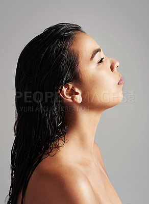 Buy stock photo Woman, profile and beauty with skincare in haircare, cosmetics or shower on a gray studio background. Young female person or model with wet hair for spa, hygiene or salon treatment on mockup space