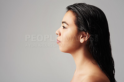 Buy stock photo Woman, profile and haircare with salon cosmetics, skincare or beauty on a gray studio background. Young female person or model with wet hair or shower for spa, hygiene or keratin treatment on mockup