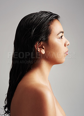 Buy stock photo Woman, profile and beauty with haircare, salon or cosmetics on a gray studio background. Young female person or model with wet hair or shower in spa wash, hygiene or keratin and facial treatment