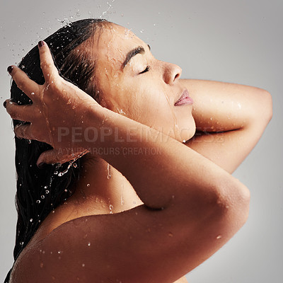 Buy stock photo Shower, washing hair and face of woman with water in studio for wellness, cleaning and grooming. Beauty, bathroom and profile of female person for hygiene, self care and cleansing on gray background