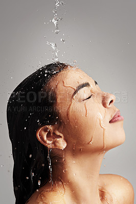 Buy stock photo Shower, water and face profile of woman in studio on gray background for wellness, cleaning and satisfaction. Skincare, bathroom and female person with beauty for washing hair, hygiene and cleansing