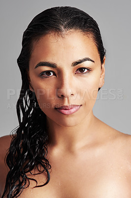 Buy stock photo Woman, portrait and beauty with makeup cosmetics, skincare or haircare on a gray studio background. Face of young female person or model with wet hair for hygiene, facial treatment or dermatology