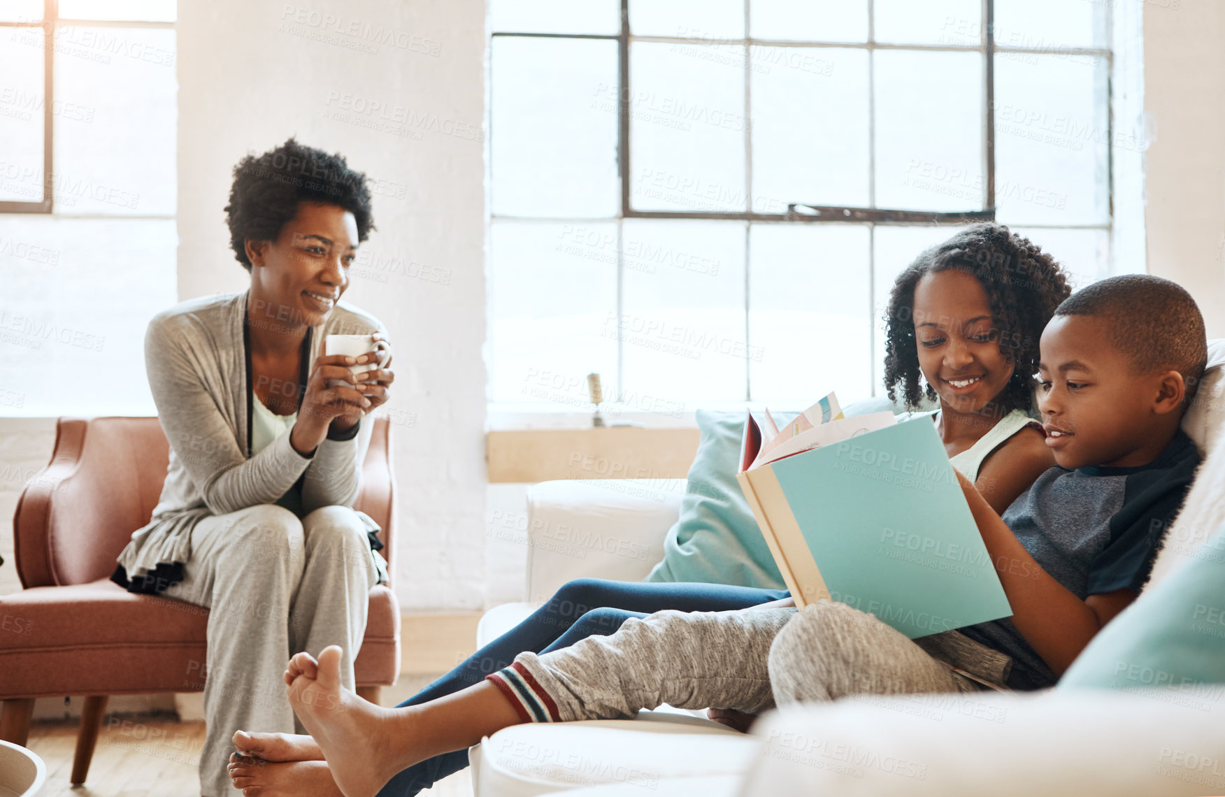 Buy stock photo Home, relax and mother with kids, reading book and happiness with fantasy, learning and bonding together. Apartment, single parent on sofa and mama with children, love and literature in living room