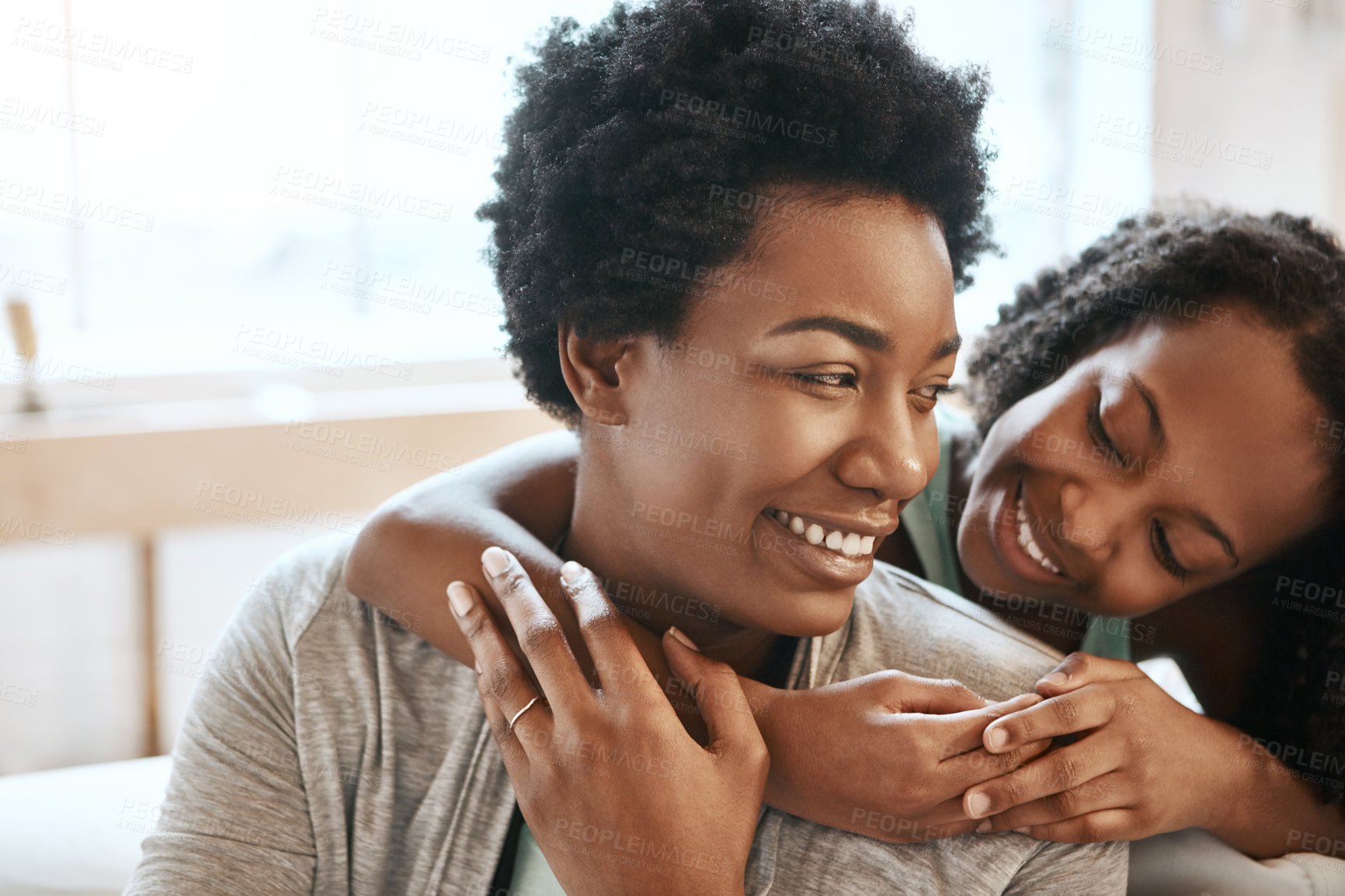 Buy stock photo Happy woman, young girl and love with hug in growth for development, relationship and family for support. Mother, daughter and bonding in lounge for childhood, affection and trust for child care
