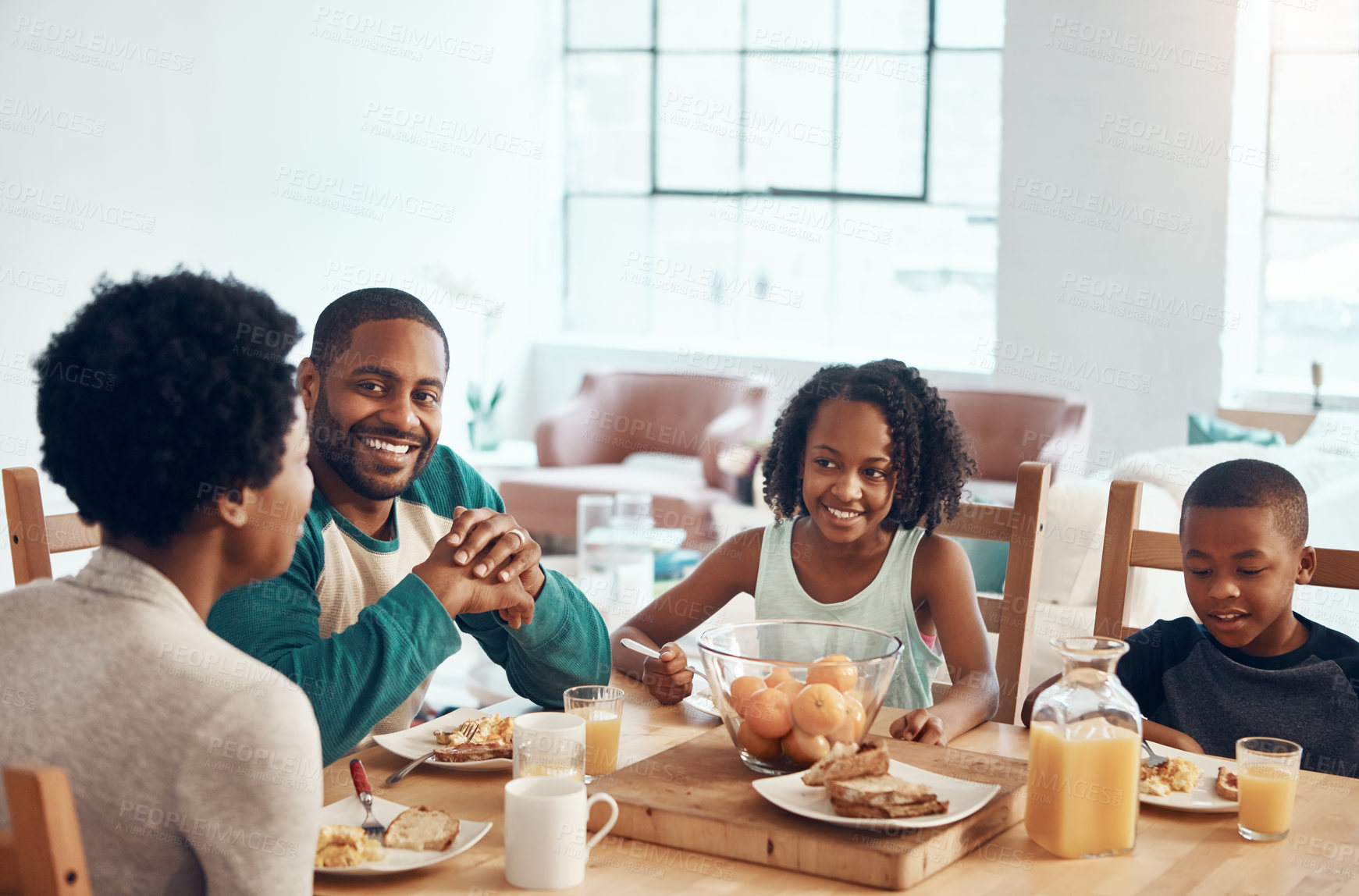 Buy stock photo Black family, parents and kids for breakfast in morning with eating, bonding and happy in dining room. Love, mother and father with children with food, eggs and bread for nutrition and hungry in home