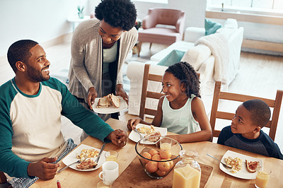 Buy stock photo Happy family, parents and kids with food for breakfast in home with serving, bonding and top view in dining room. Black people, mom and dad with children in morning with eggs and bread for nutrition