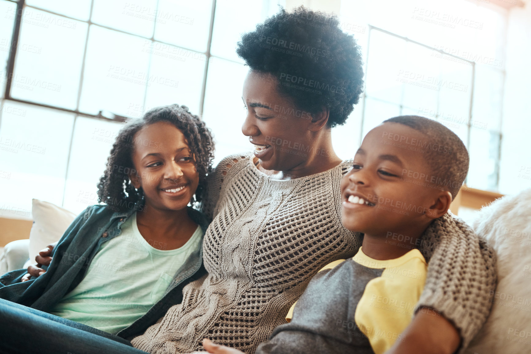 Buy stock photo Love, mother and children relax sofa for happy family time together in apartment in South Africa on weekend. Smile trust and support, black woman and kids sitting on couch with healthy relationship.