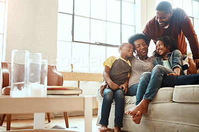 Buy stock photo Love, black family and playful in living room, couch and bonding for quality time, loving and break. Mother, father and children on sofa in lounge, happiness and smile on weekend, playing and relax
