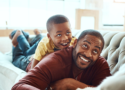 Buy stock photo Happy family, father and son on sofa, relax and play, happy and smile while bond in their home. Love, parent and child excited, playful and cheerful In a living room, joy and enjoy weekend together 