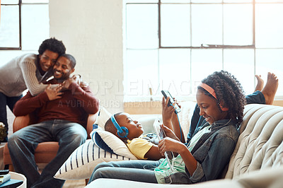 Buy stock photo Tablet, relax and black family children, parents or African people happy together, bond and enjoy quality time. Love, digital tech and youth kids listening to music, streaming video or online gaming