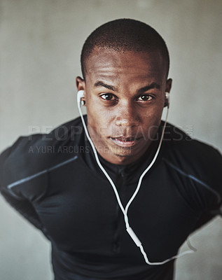 Buy stock photo Man, portrait and music for fitness outdoor with serious, listening to podcast and exercise for healthy body. Athlete, african person and earphones with face, radio and sound for workout or training