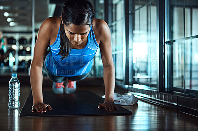 Buy stock photo Sports, push up and woman in gym for workout with strength, wellness and arms training. Serious, health and female athlete with exercise for body goals for muscles and power in fitness center.