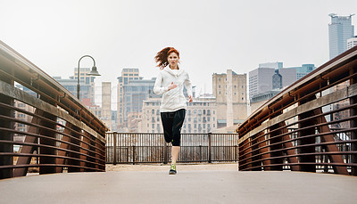 Buy stock photo Portrait, woman and running by bridge in city, endurance and speed with fitness in Germany. Training, female runner and preparation for marathon, challenge and healthy living with workout outdoor