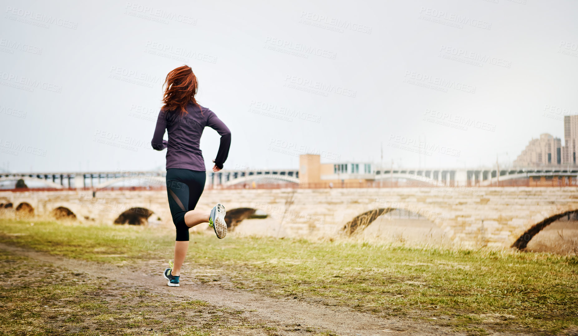 Buy stock photo Back, woman and running by city outdoor, endurance and speed with fitness in Germany. Training, female runner and preparation for marathon, challenge and exercise with workout in nature by mockup