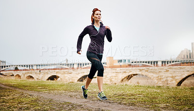 Buy stock photo Endurance, woman and running by nature outdoor, speed and exercise with fitness in Germany. Training, female runner and preparation for marathon, challenge and pace with workout in city by mockup