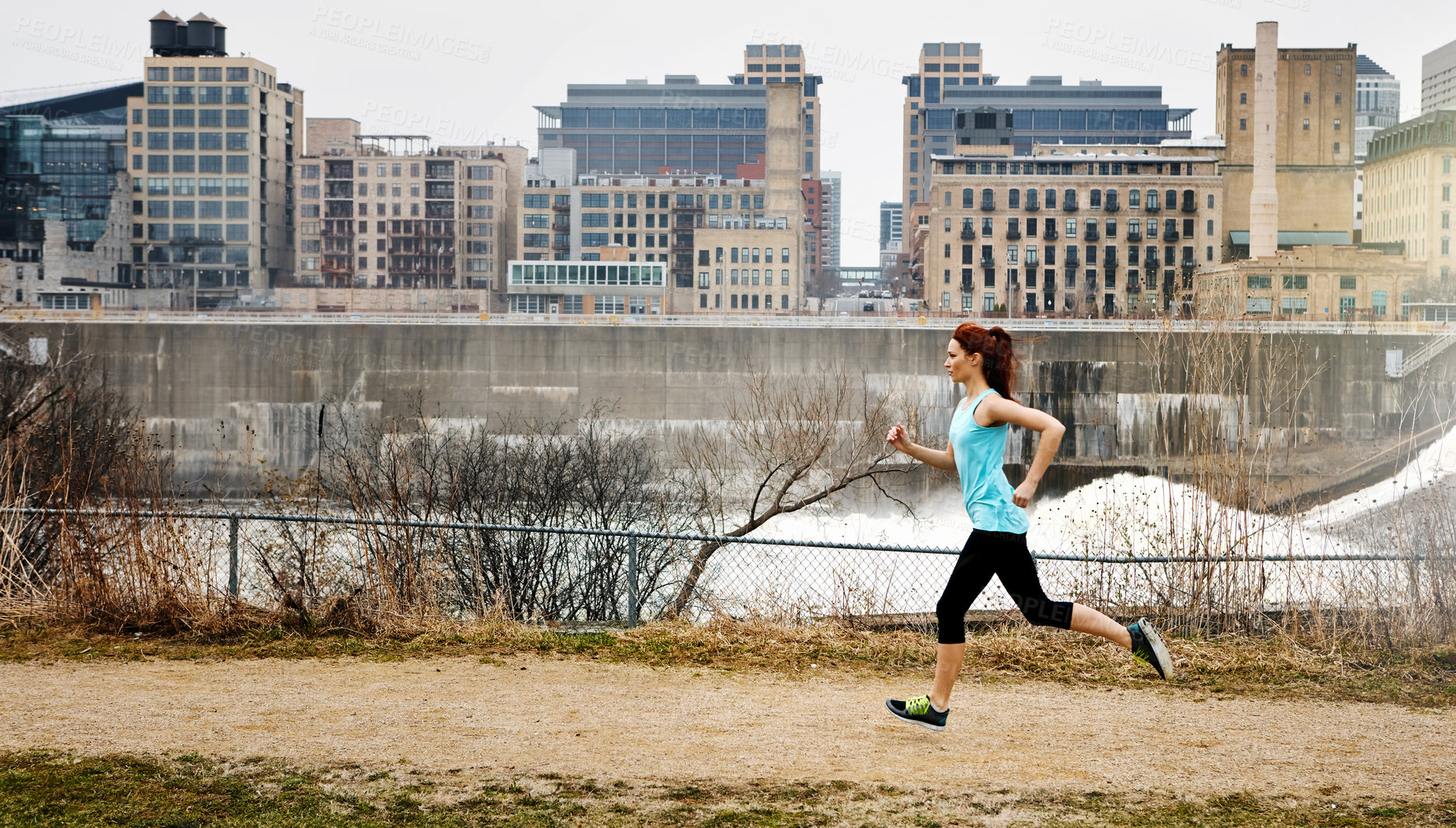 Buy stock photo Athlete, woman and runner for fitness in city with exercise, cardio training and physical activity. Person, running and sprint for challenge, endurance workout and performance for wellness outdoor