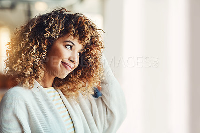 Buy stock photo Shot of a beautiful young woman indoors