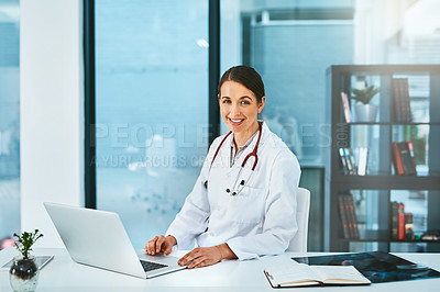 Buy stock photo Doctor, woman and portrait in office with laptop, medical research and planning hospital schedule. Female person, smile and confident for healthcare, cardiologist and clinic website for medicare