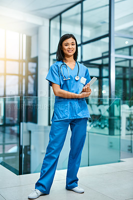Buy stock photo Nurse woman, portrait and smile with tablet for service, healthcare and happy for job in hospital. Asian female medic, happiness and tech for medical career, helping and pride for working in clinic