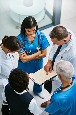 Buy stock photo Teamwork, clipboard and medical with doctors in hospital for consulting, planning and communication. Medicine, healthcare and checklist with group of people for support, review and analysis
