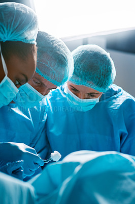Buy stock photo Surgery, operating room and team of doctors with focus for healthcare, teamwork and tools for professional medicine. Medical innovation, health care and surgeon with expert staff in hospital icu. 