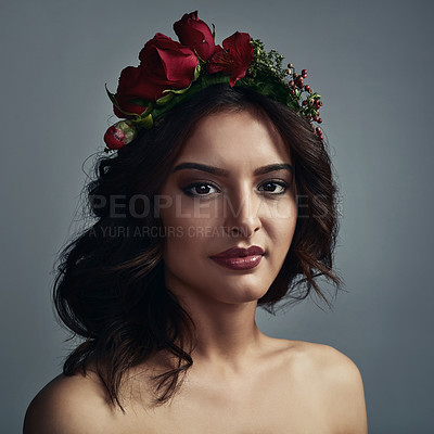 Buy stock photo Portrait, wreath and woman in studio, confident and fantasy with floral, skincare and sustainability. Grey background, proud and glow of skin with treatment, flowers and natural cosmetics with rose