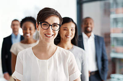 Buy stock photo Woman, business and happy in portrait with team in office for leadership, teamwork and career goals together. Diverse, people and glasses with pride, collaboration and support of startup company