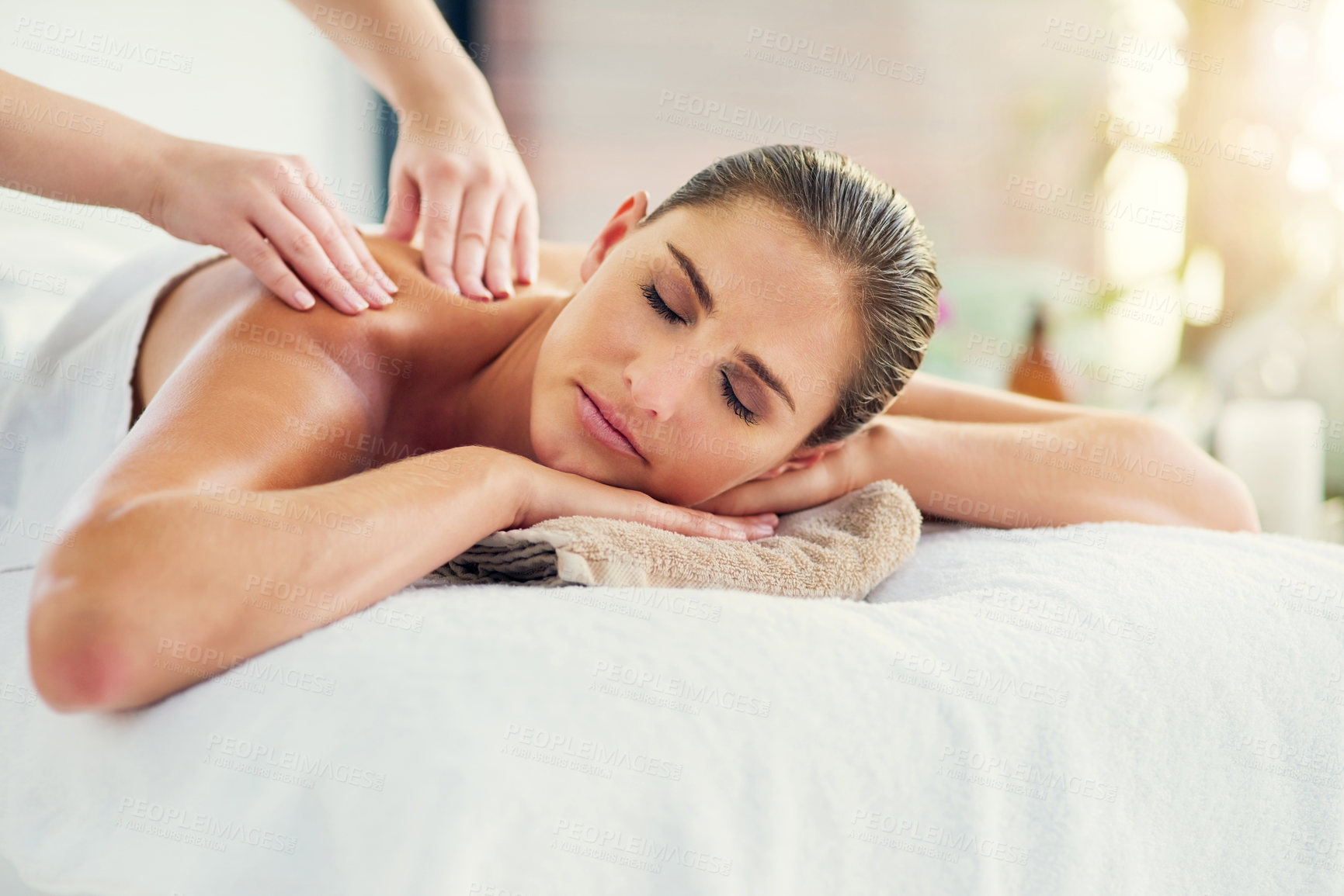 Buy stock photo Face, hands and massage with woman in spa to relax as customer for hospitality or wellness. Holistic, peace and stress relief with person in luxury hotel or salon for detox, retreat or treatment